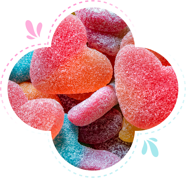 Group 1321317511 (1) Colorful sugar-coated gummy candies in heart shapes, arranged closely together.