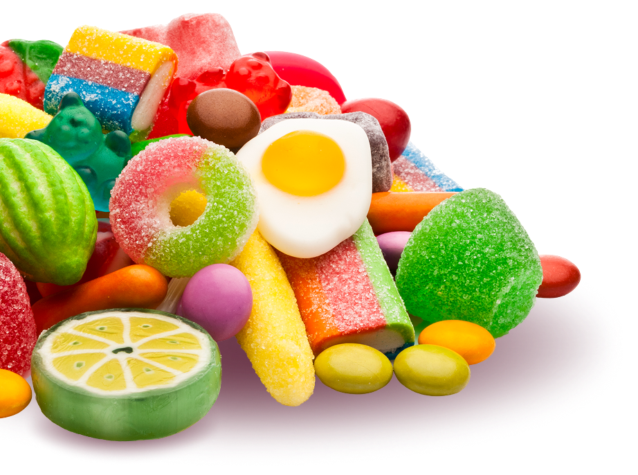 Group 31 A colorful assortment of various candies, including gummy bears, licorice, and candy resembling a fried egg.